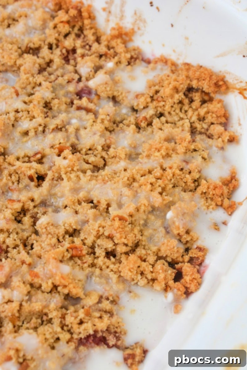 Adding glaze to the crumble after baking