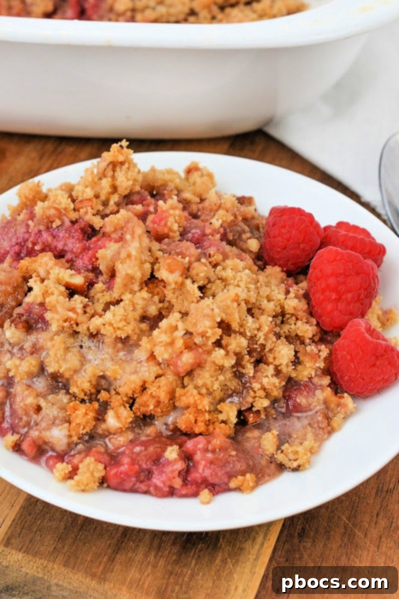 Raspberry crumble baking in a glass dish