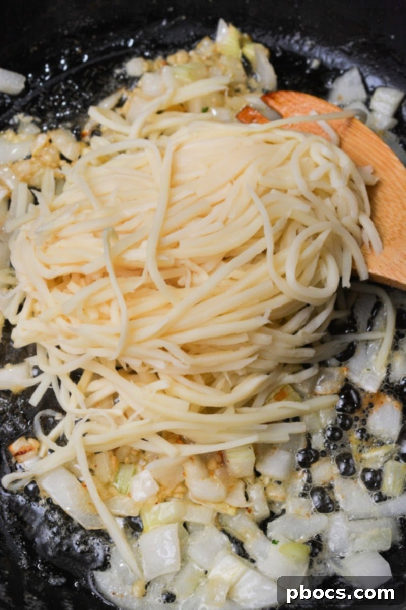 Keto Chicken and Spinach Noodles 13 Adding noodles to the onions