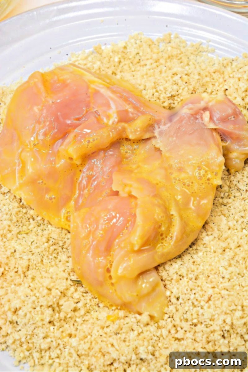 Coating chicken cutlets in keto breading