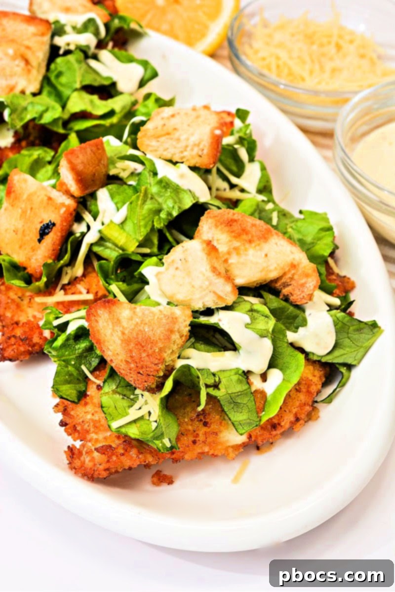 Keto Chicken Caesar Cutlets garnished and ready to serve