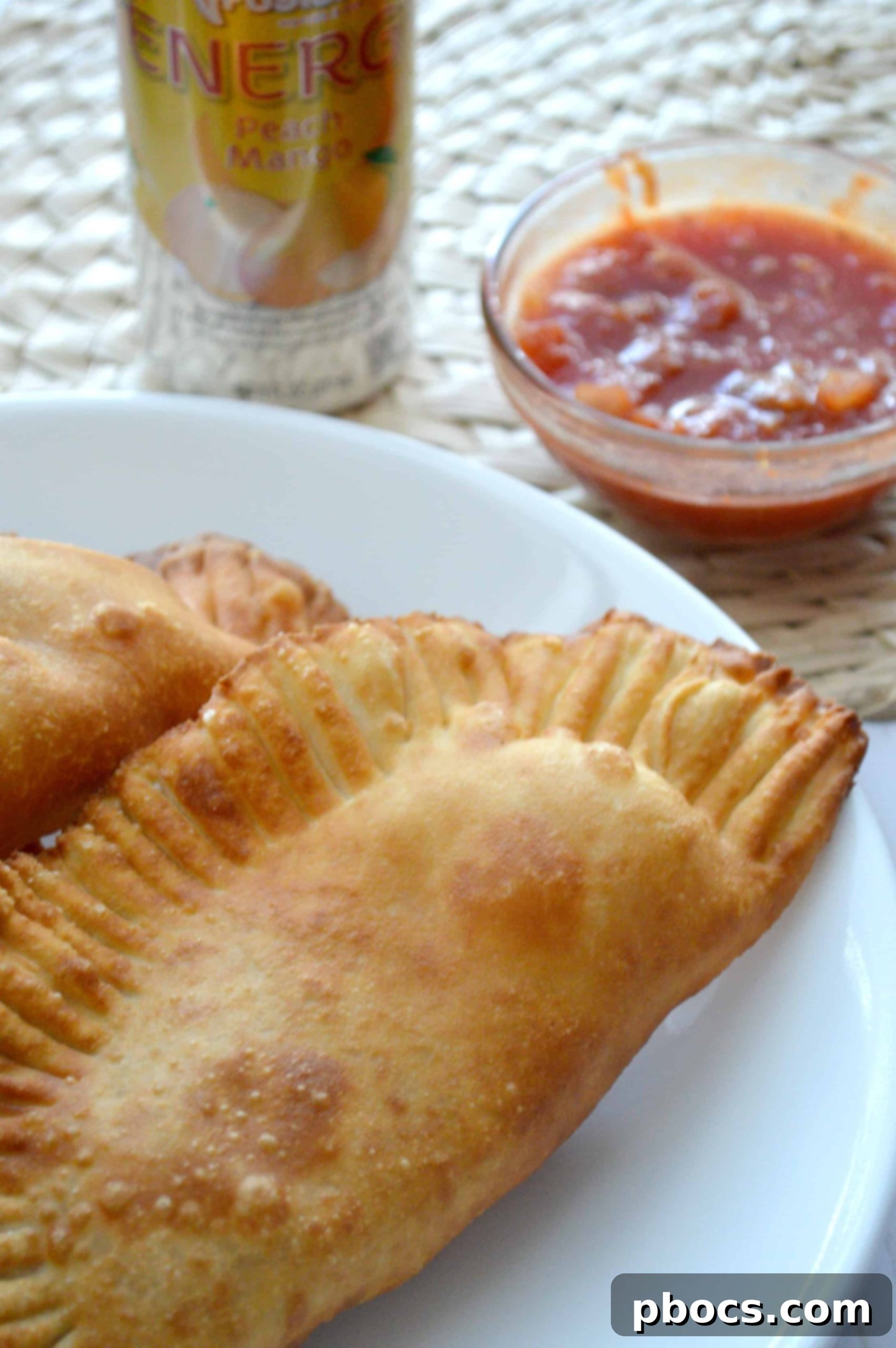 Golden brown chicken empanadas fresh from cooking