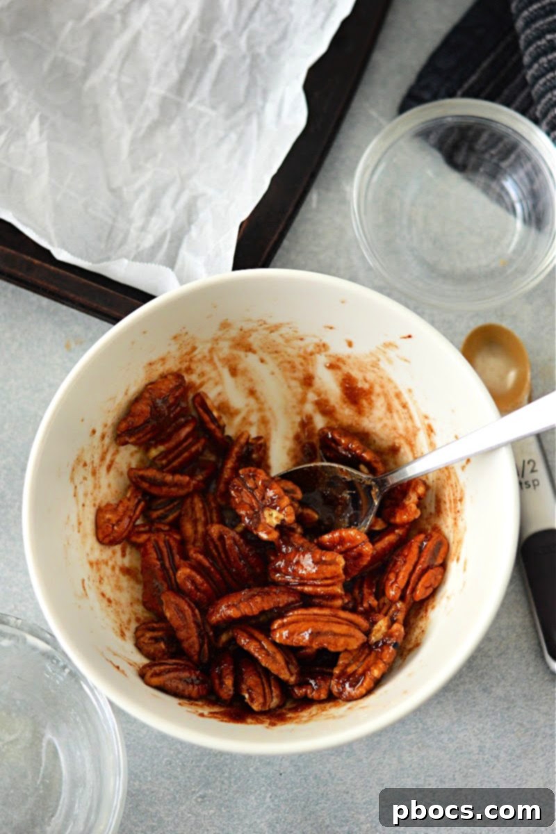 Mixing pecans for candied topping