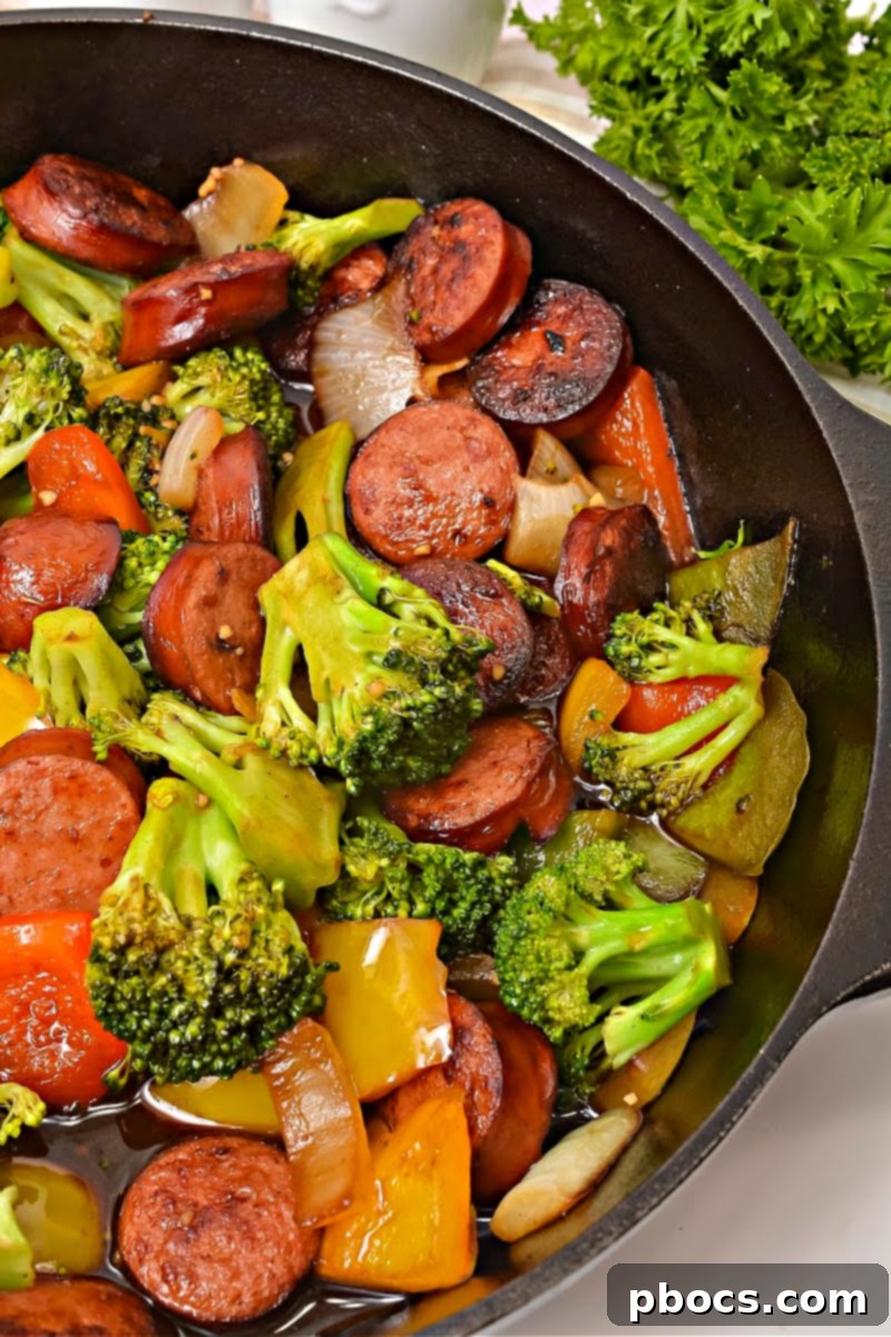 Low Carb Asian Sweet and Sour Kielbasa plated with a mix of bell peppers