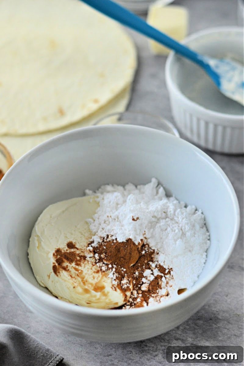 Keto Cinnamon Cream Cheese Delights 8 Blending cream cheese mixture for keto bites