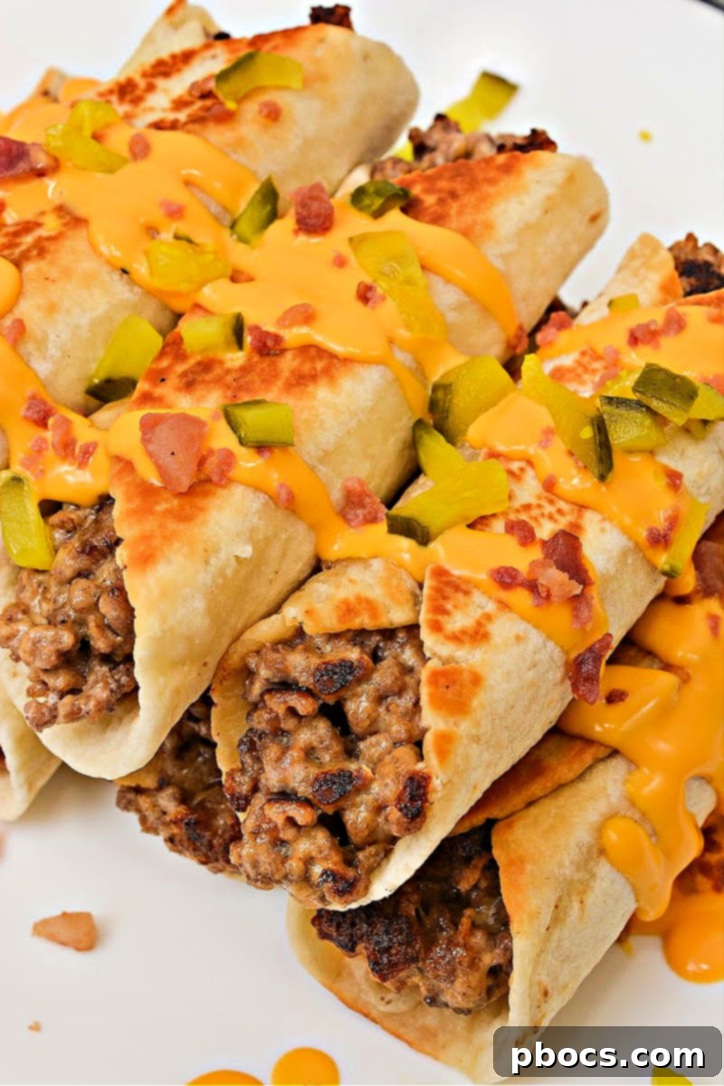 Keto Beef & Cheese Spirals 2 Keto Cheesy Beef Roll Ups - a portable low-carb cheeseburger alternative made with ground beef and cheese wrapped in a tortilla