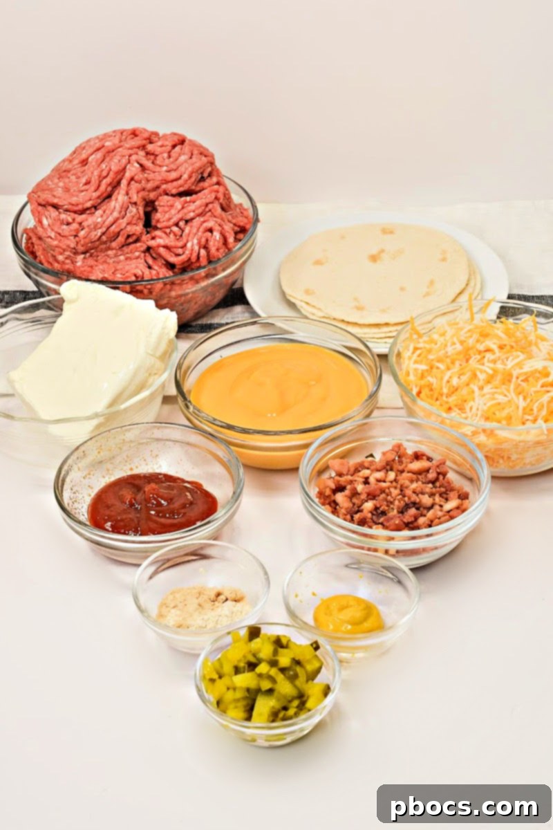 Keto Beef & Cheese Spirals 8 All ingredients laid out for making Keto Cheesy Beef Roll Ups, including ground beef, cheese, and tortillas