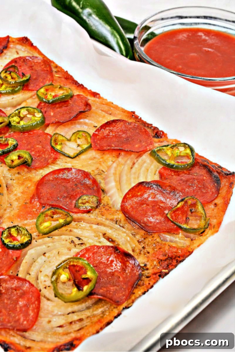 Freshly baked Keto Viral Onion Ring Pizza ready to slice