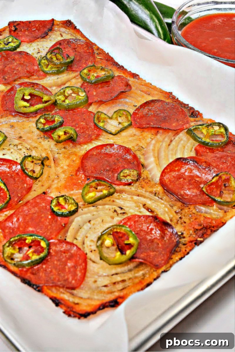 Keto Viral Onion Ring Pizza with pepperoni and jalapeno toppings