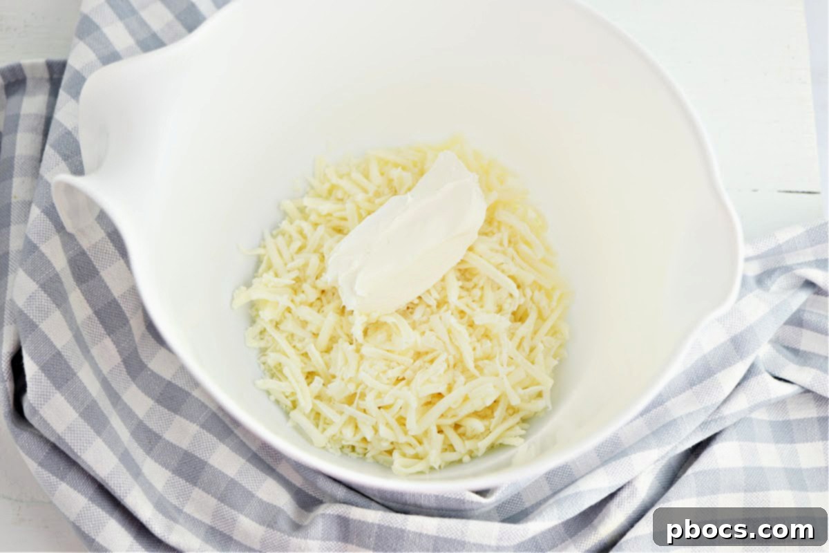 Melted mozzarella and cream cheese for fathead dough.