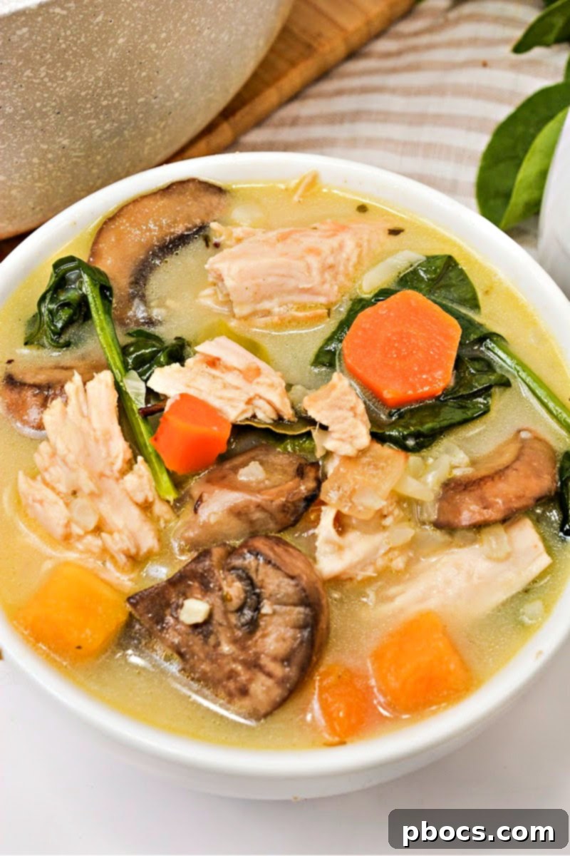 Stored portions of Low-Carb Autumn Chicken and Rice Soup in jars