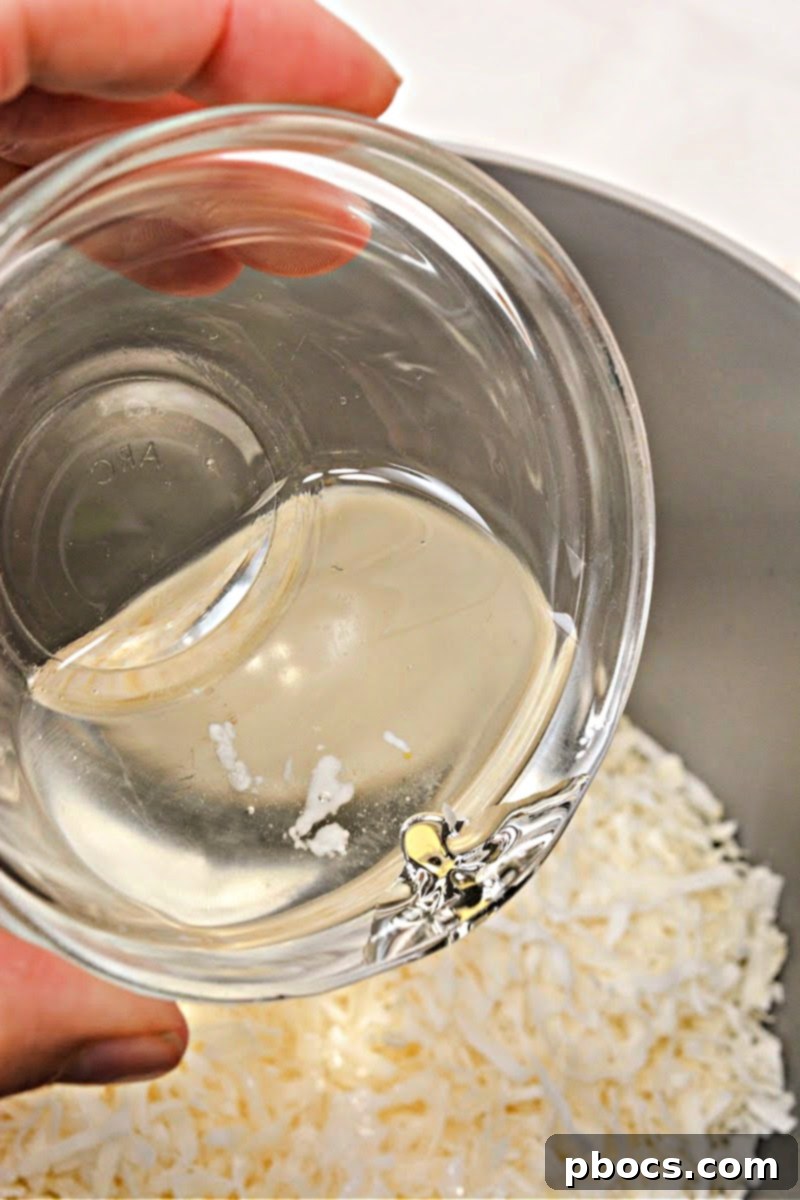 Keto Coco-Almond Bliss Bites 8 Step-by-step: Forming coconut clusters for your homemade Keto Almond Joys