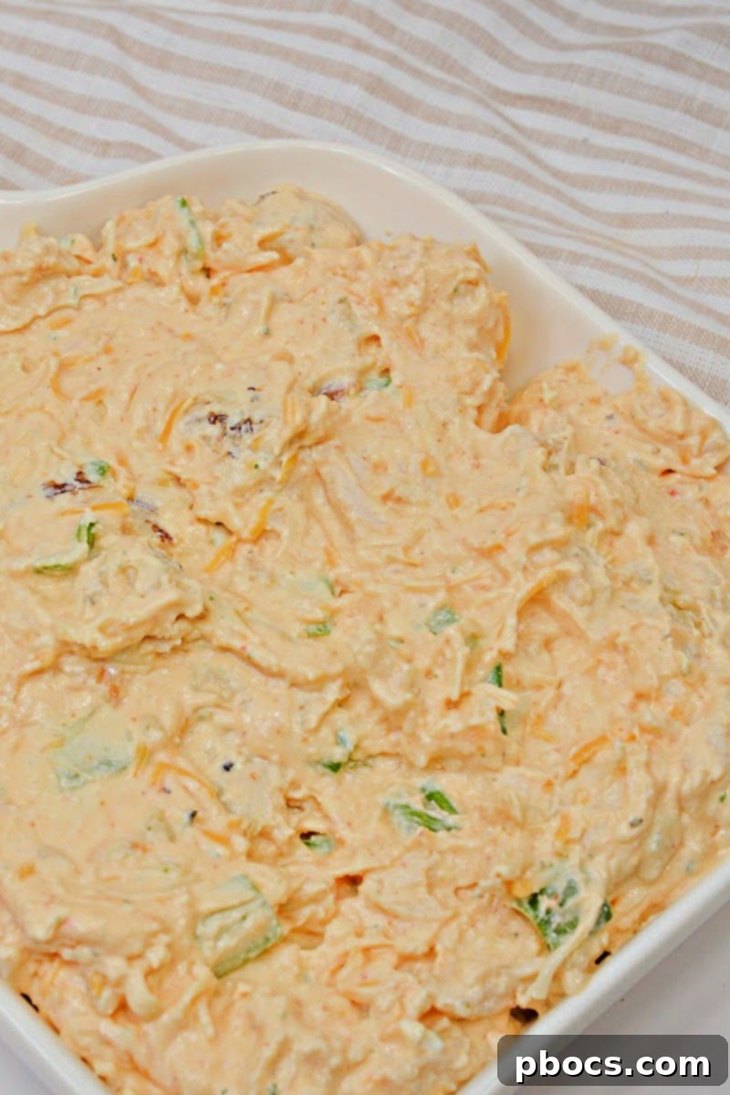 Step 5: Stir to Combine Buffalo Chicken Dip Ingredients