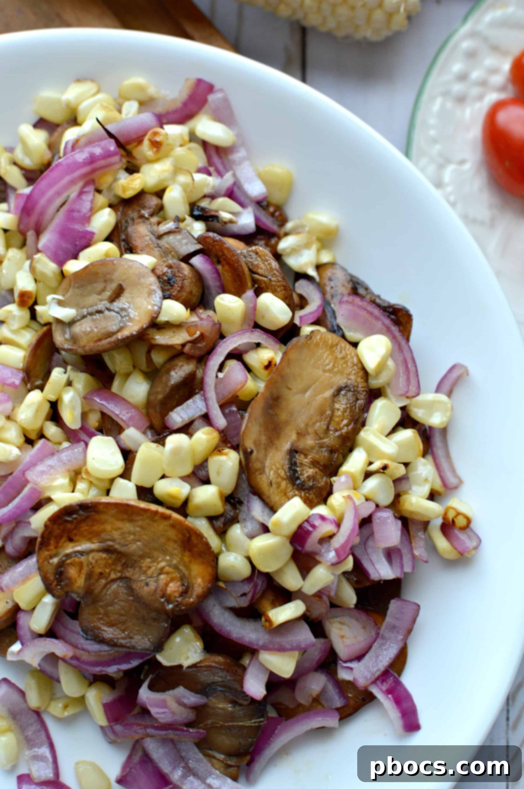 Effortless Efficiency Getting Things Done with an Easy Mushroom Corn Salad 3 Sautéed mushrooms cooking in a pan until golden brown and tender, a key step for the savory salad.