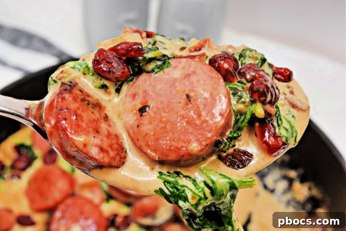 Creamy White Cheddar Kielbasa Skillet with savory sausage slices