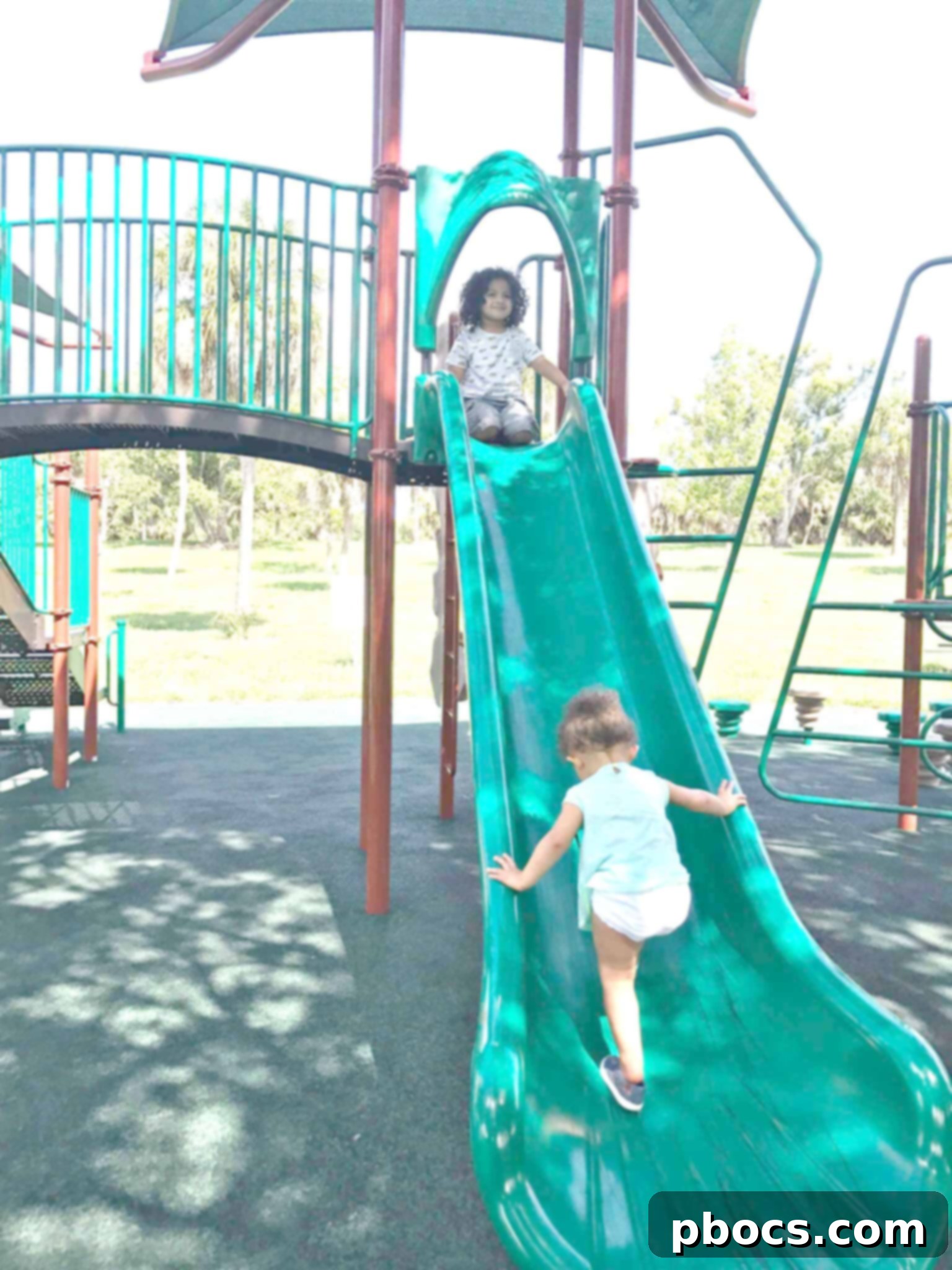 Child looking out a window, possibly in a moment of quiet contemplation or boredom, with natural light.