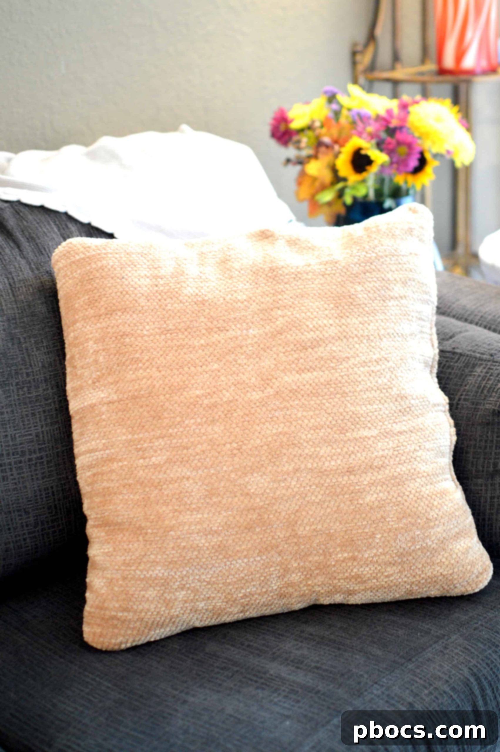 Autumn Nesting: Preparing Your Home and Nursery 3 Cozy throw blanket draped over a chair