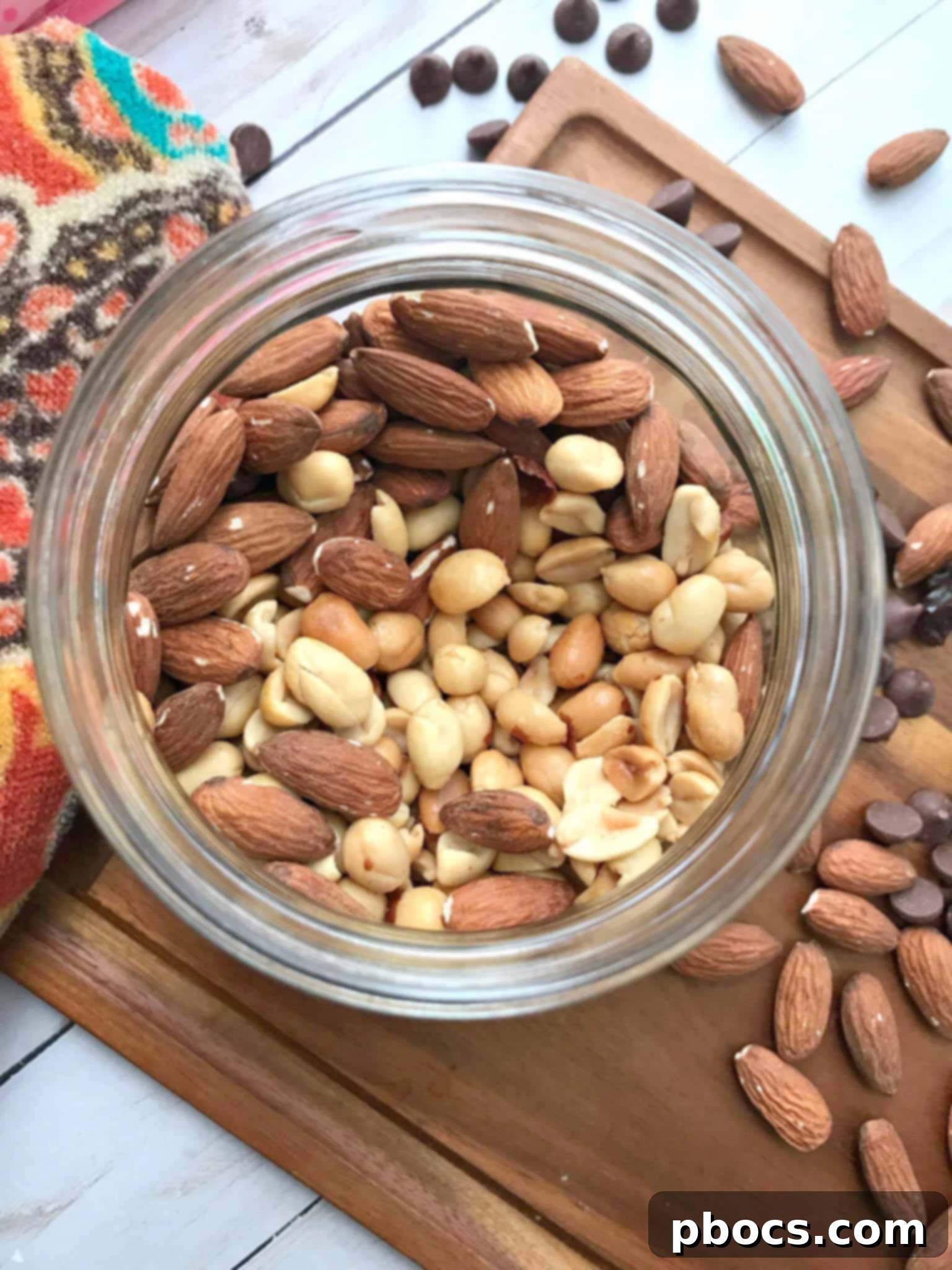 Ingredients for Homemade Trail Mix: Almonds, Peanuts, Dark Chocolate Chips, Raisins