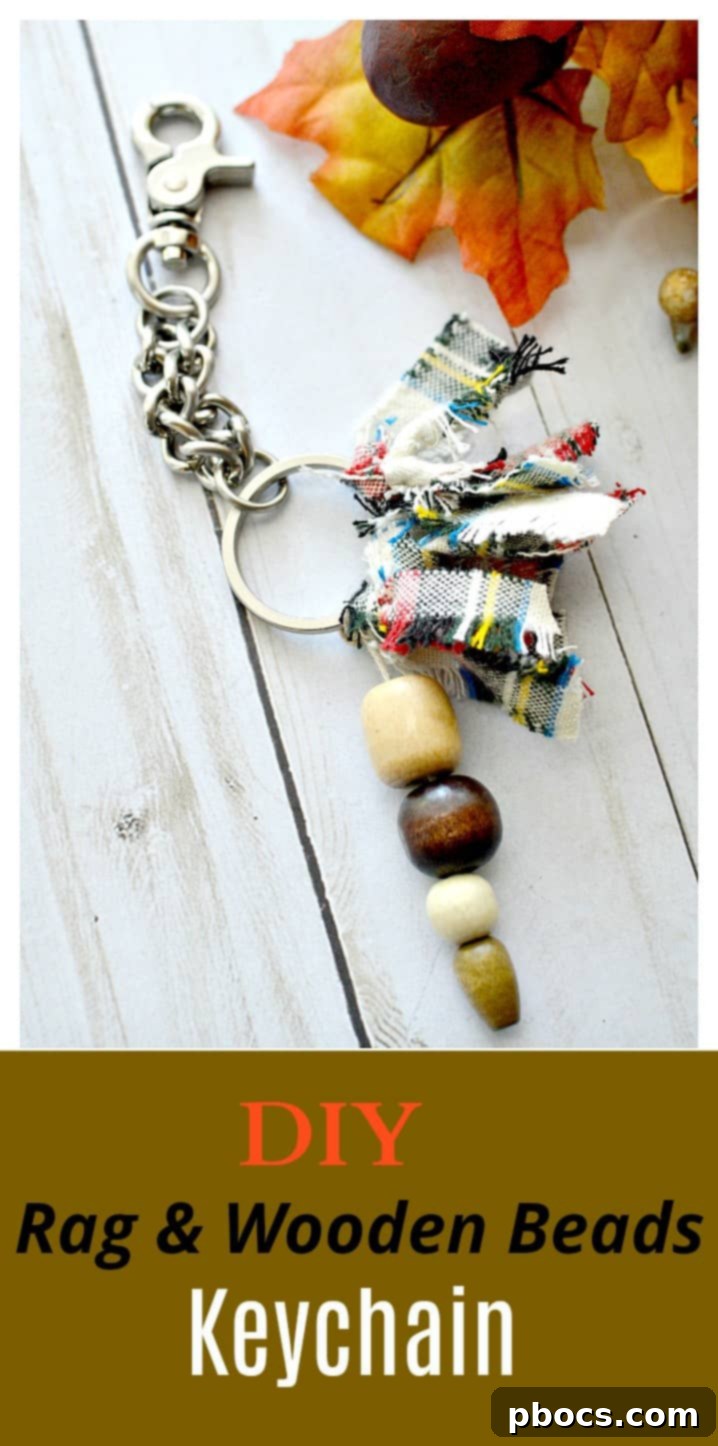 A close-up of a purse with a fabric strip tied to its handle, matching the DIY keychain.