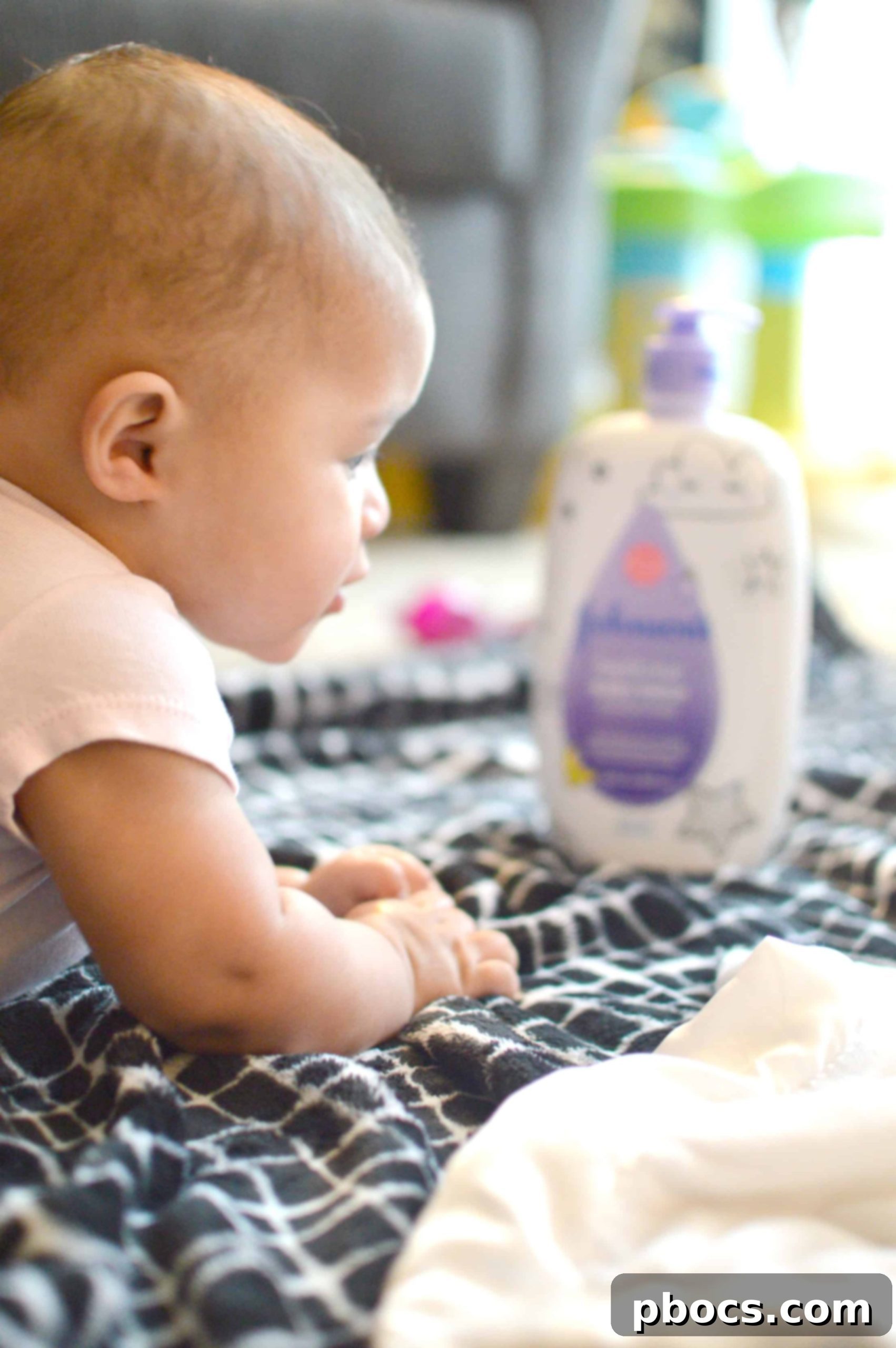 Stylish bathroom shelf featuring Johnson's baby products and fresh flowers