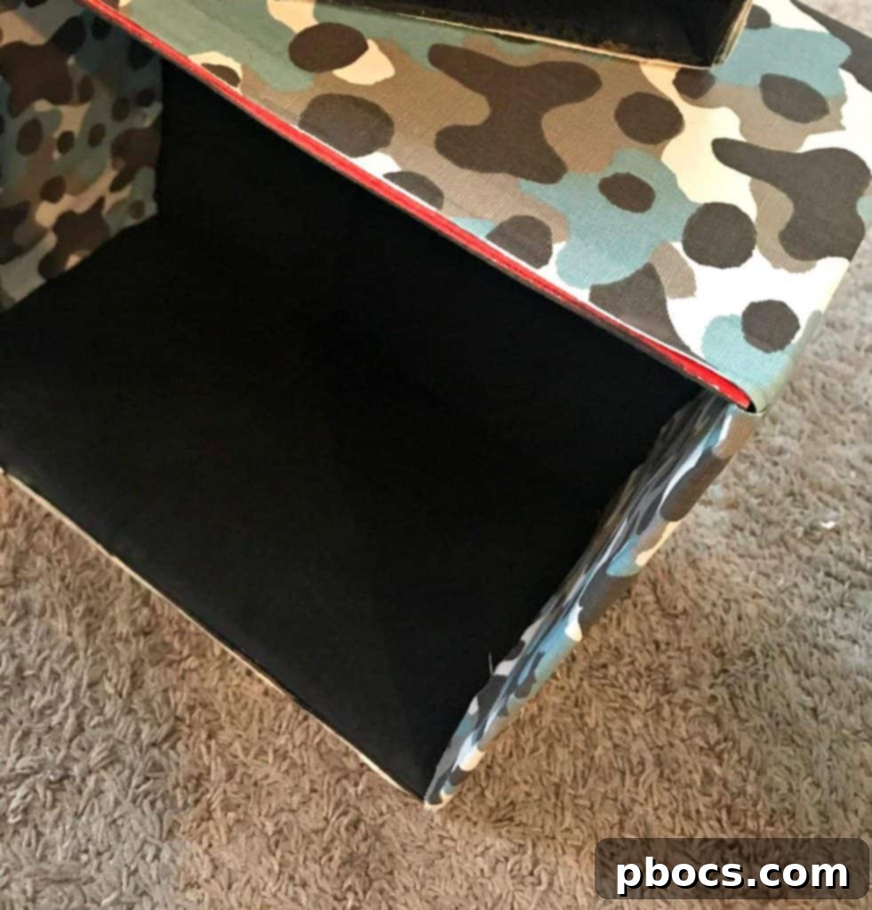 DIY Nursery Storage Solutions 6 Lining the inside of the boxes with fabric