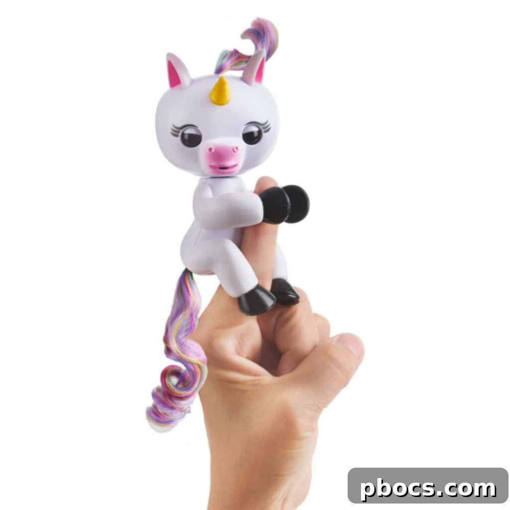 Fingerlings Baby Unicorn Gigi displaying a happy expression