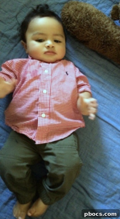 Comfy Chic Baby Joggers 4 Close-up of baby boy's jogger pants and checkered polo shirt