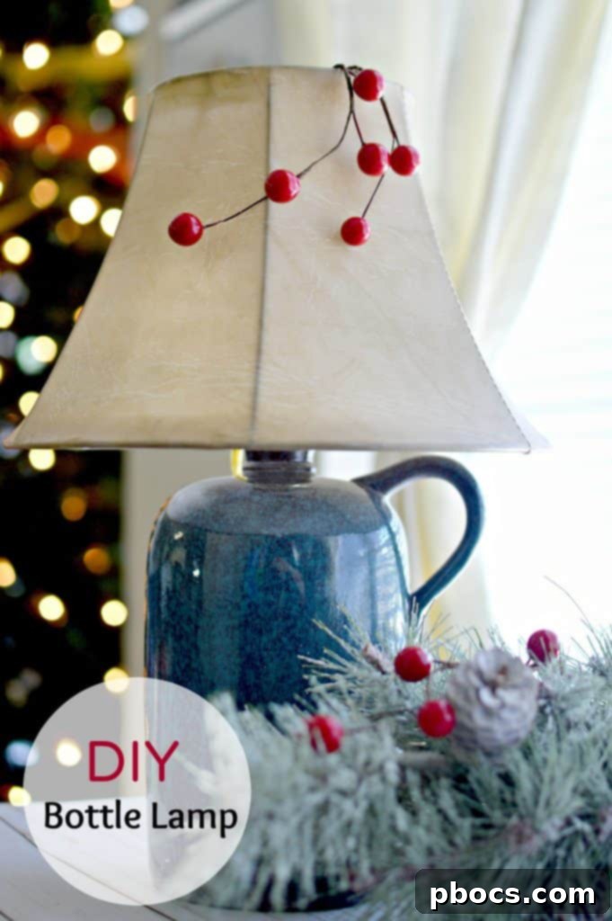 Finished DIY Bottle Lamp on a desk with Christmas decorations