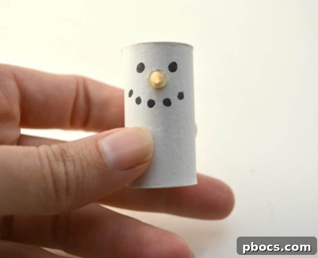 Preparing Wooden Nose for Wine Cork Snowman Cutting wooden toothpick for snowman nose