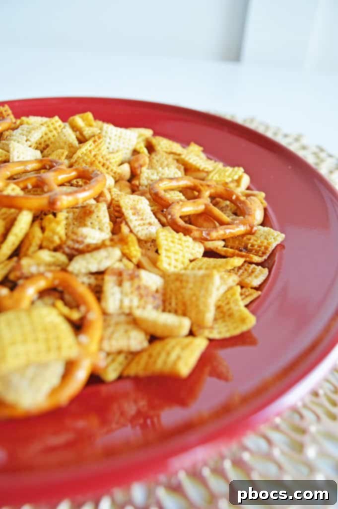 Irresistible Slow Cooker Chex Mix 10 Close-up of crispy, seasoned homemade Chex Mix.
