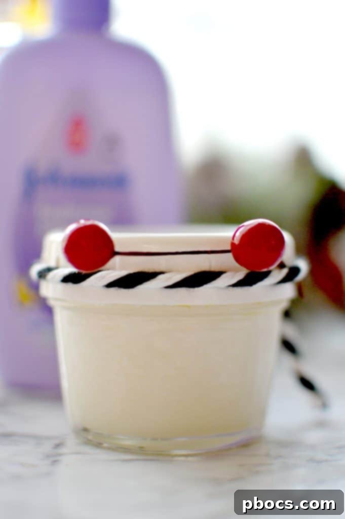 DIY Lavender Sugar Scrub jar with ribbon, perfect for gifting.