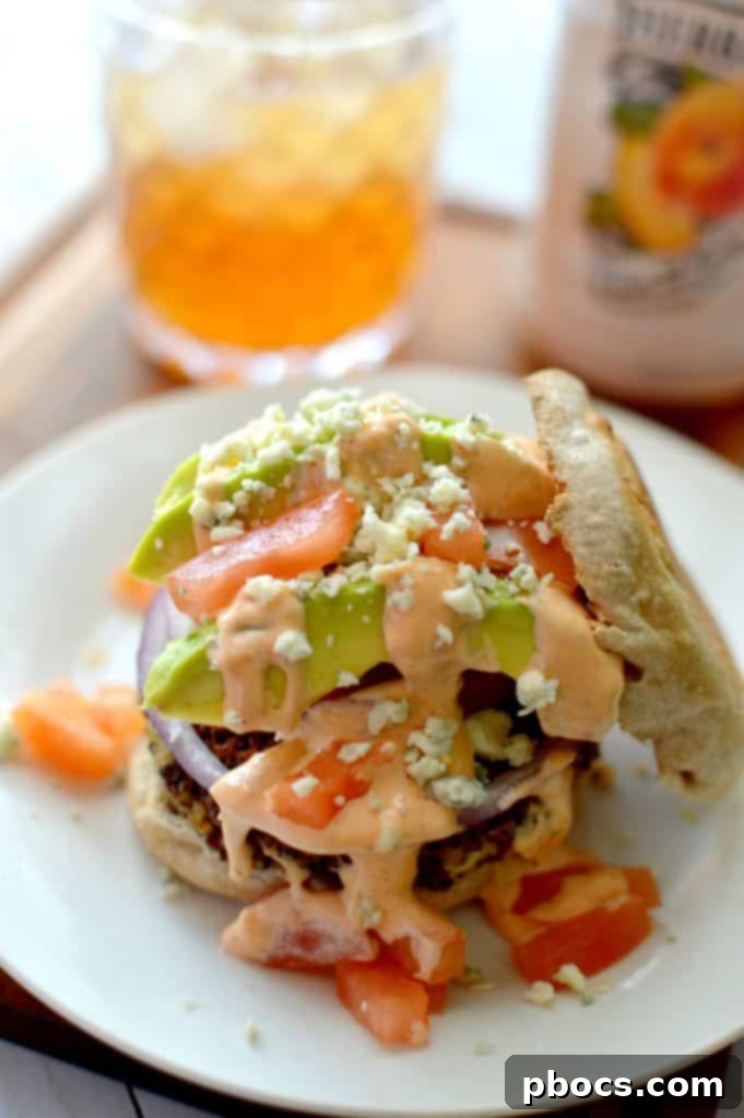 Two halves of a spicy blue cheese and avocado quinoa burger