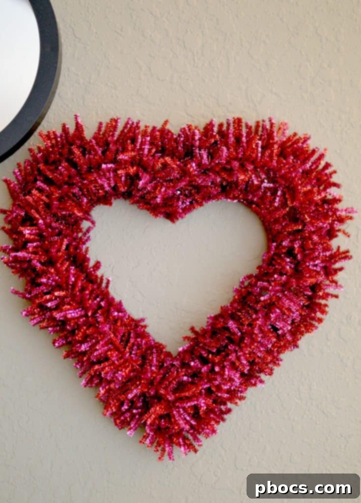 Close-up of pipe cleaners twisted onto a wire frame