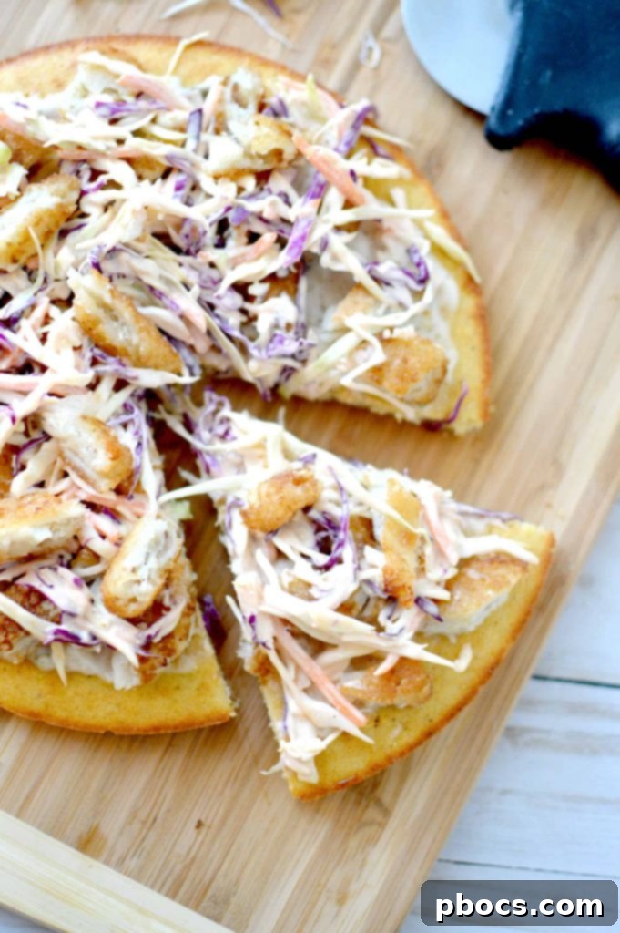 Delicious Beer Battered Fish Pizza on a wooden board