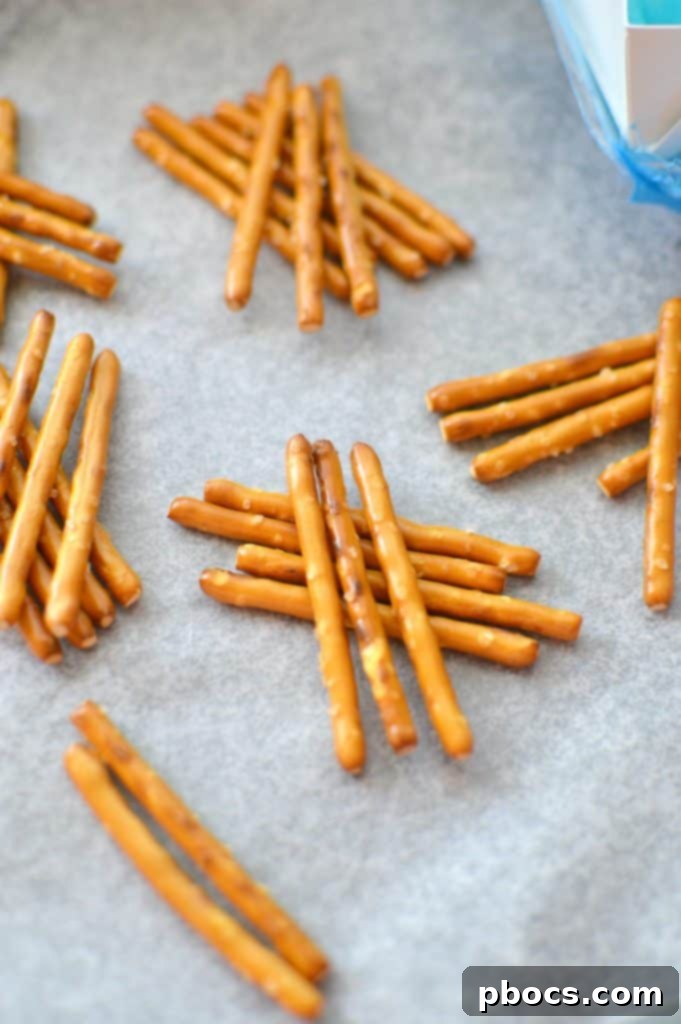 Peeps White Chocolate Pretzel Birds Nest - Pretzel Base Arranging pretzel sticks for birds nest base