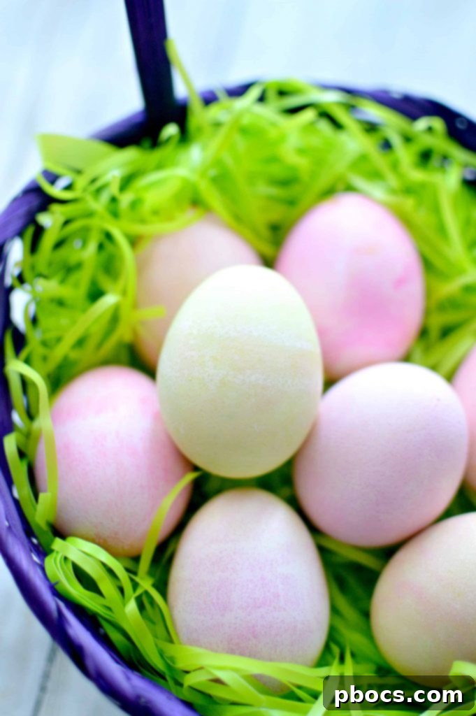 Beautifully marbled Easter eggs dyed with shaving cream, showcasing a variety of vibrant colors and unique patterns.