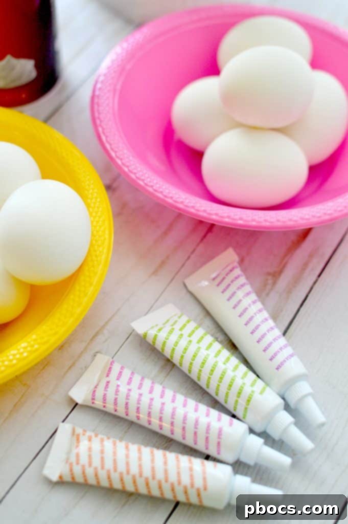 Collection of ingredients needed for shaving cream Easter eggs: hard-boiled eggs, shaving cream, and various food colorings.