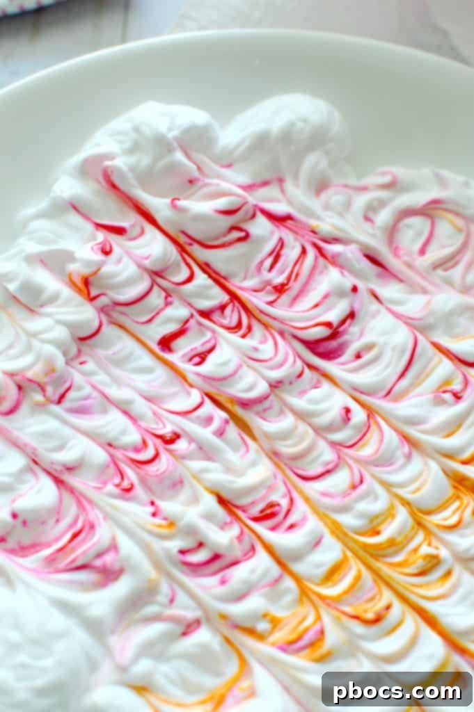 Spreading a light, even layer of foam shaving cream in a tray to prepare for dyeing Easter eggs.