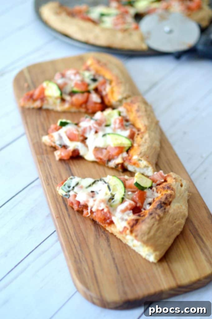 Fresh From Florida Tomato & Zucchini Family Pizza, sliced and ready to serve