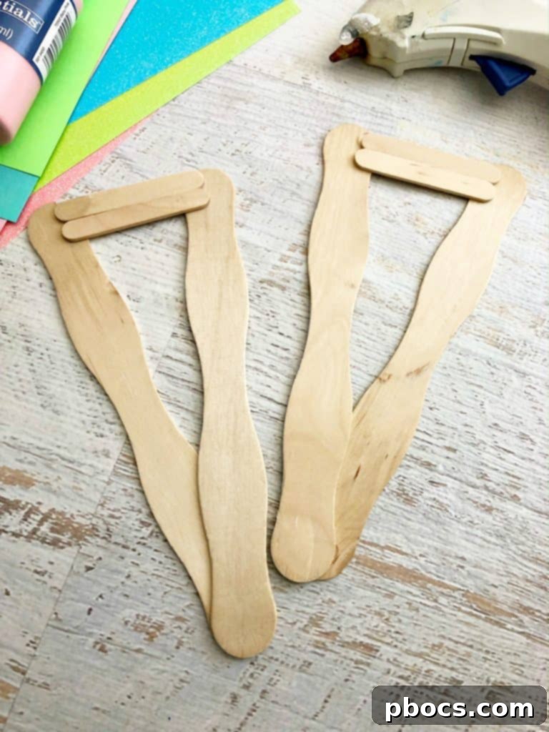 Simple DIY Mermaid Tail 4 Attaching mini craft sticks to stabilize the mermaid tail frame