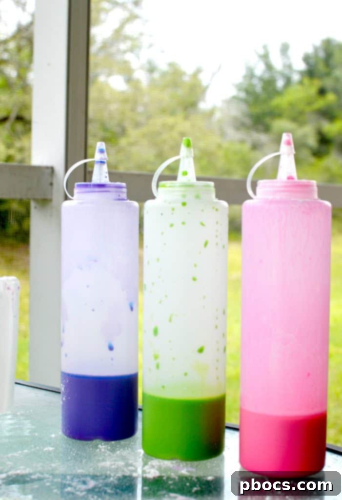 Child holding a bottle of DIY sidewalk chalk paint