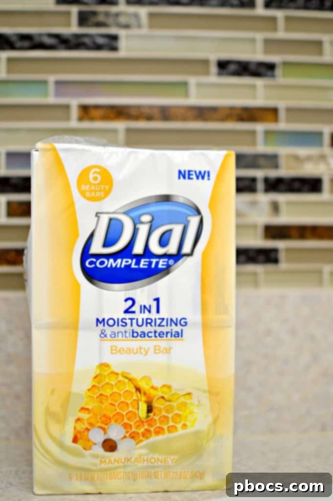 Child enjoying bathtime after playing with chalk paint