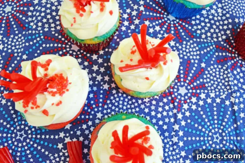 Sparkling Fireworks Cupcakes Recipe 4 Fireworks Cupcakes artfully arranged, ready for a Fourth of July celebration.
