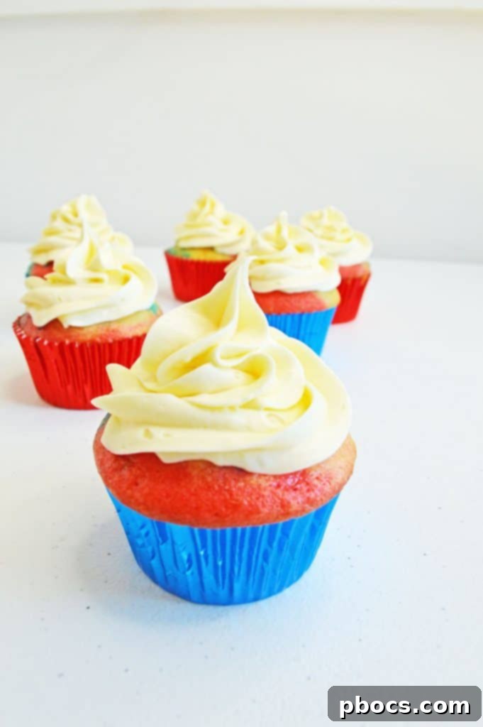 Fireworks Cupcakes Recipe Twizzlers candy trimmed and frayed to look like fireworks.