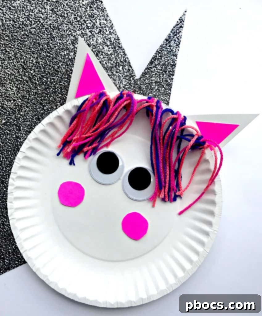 Glitter horn and paper ears glued onto the back of a paper plate