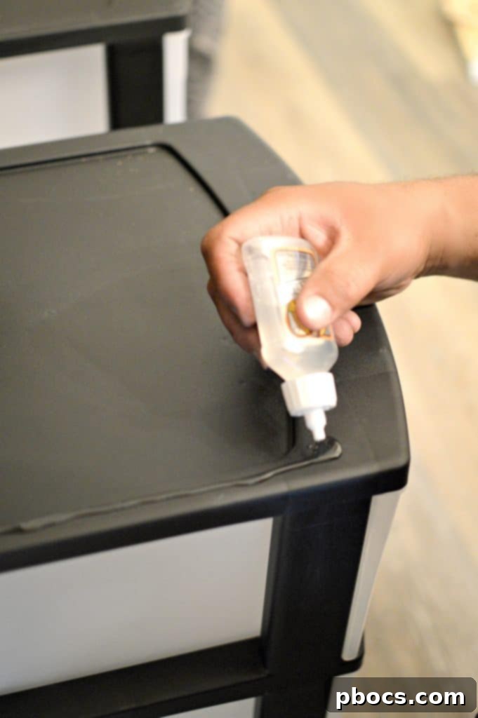 Spray painting wood for DIY Lunch Box Station